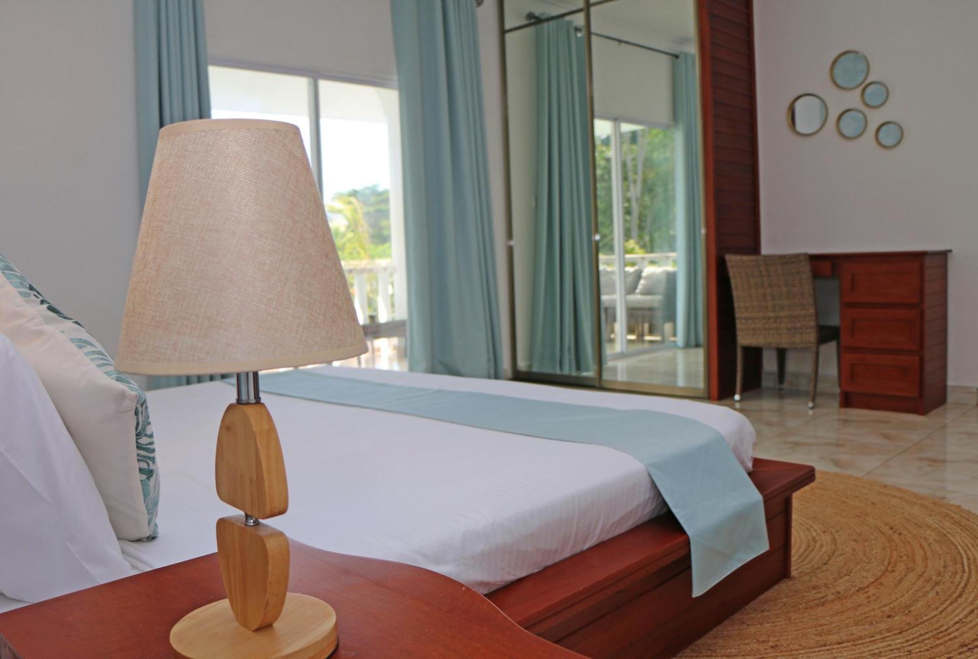 Ocean Blue Bay Apartment Anse Volbert Village Exterior foto